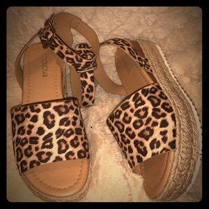 New, never worn leopard print espadrilles.